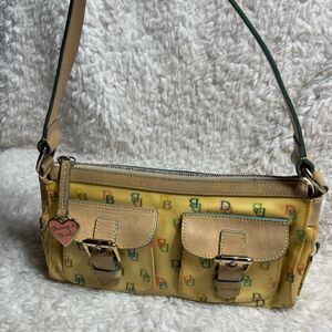 Dooney & Bourke oil cloth beige multi color logo  satchel cream leather trim